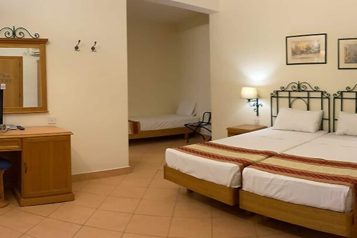 Standard Triple Room (Standard) | Minibar, desk, laptop workspace, blackout drapes