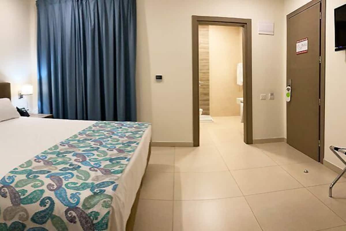 Minibar, desk, laptop workspace, blackout drapes