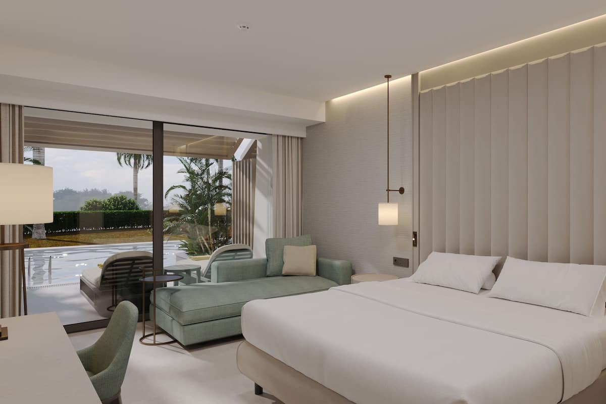 Chambre Deluxe Double ou avec lits jumeaux, en bord de piscine | Literie de qualité supérieure, articles gratuits dans le mini-bar