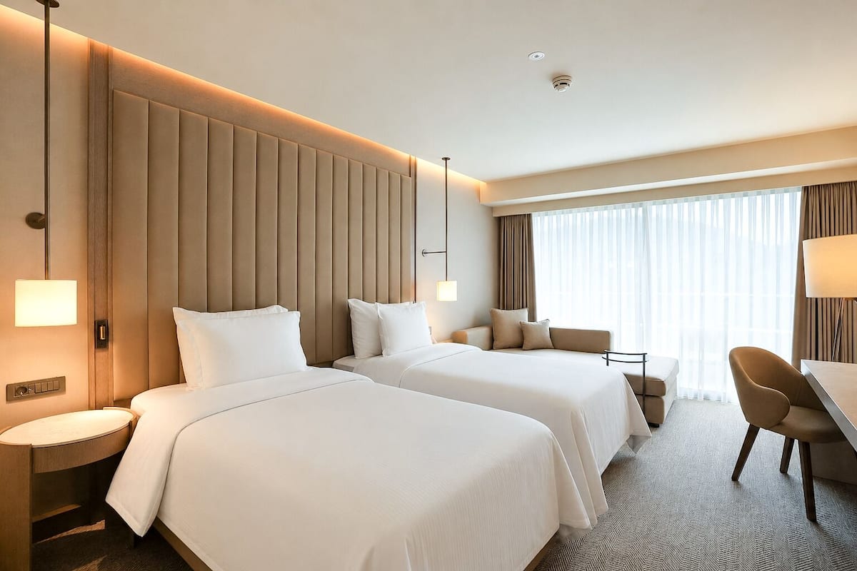 Deluxe Double or Twin Room, Sea View | Premium bedding, minibar (free items), in-room safe, laptop workspace