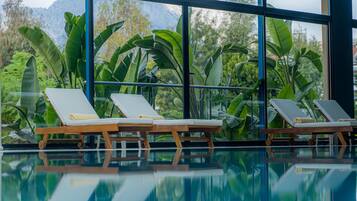 Indoor pool, 2 outdoor pools, pool umbrellas, pool loungers