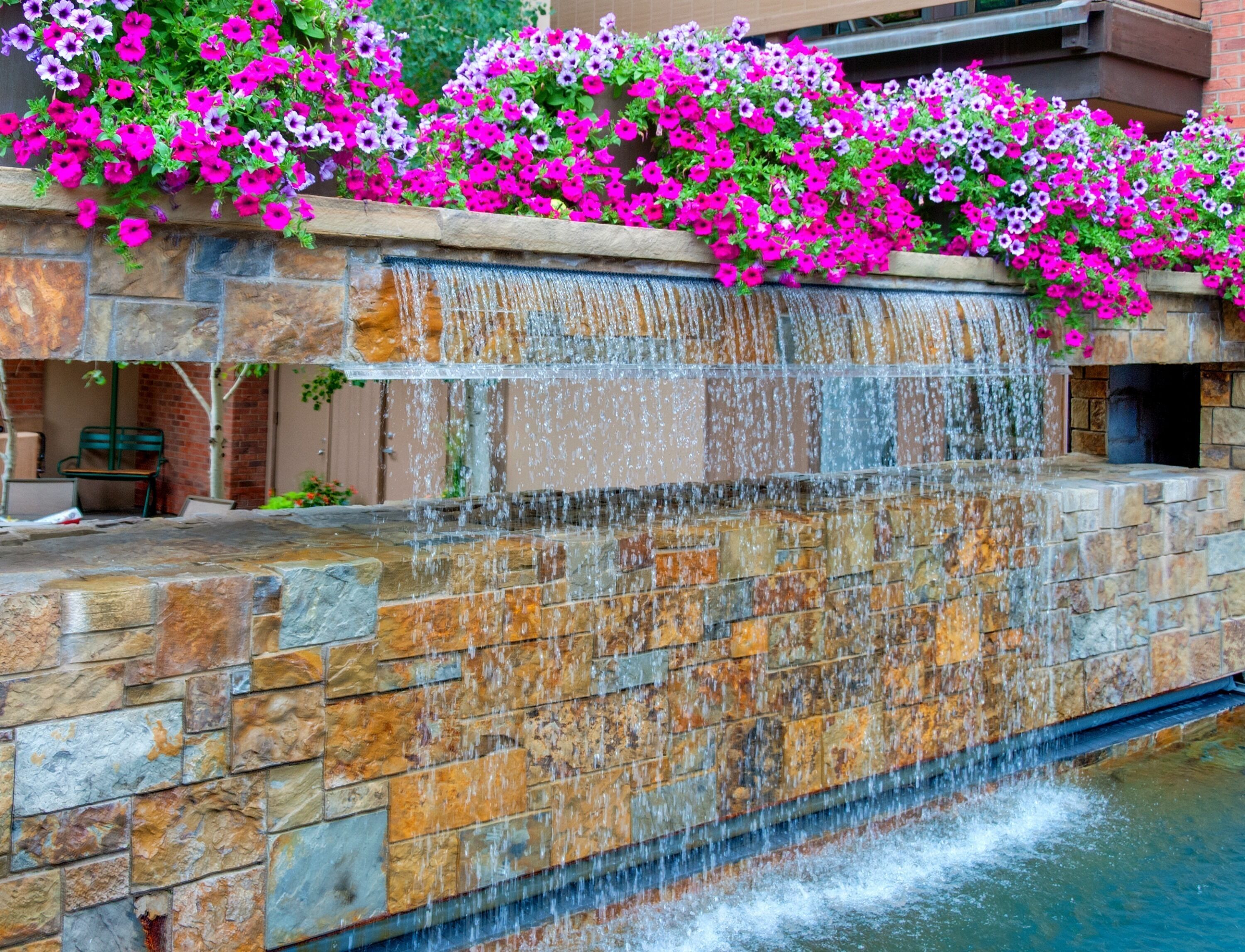 Outdoor pool, open 9:00 AM to 9:00 PM, pool umbrellas, pool loungers