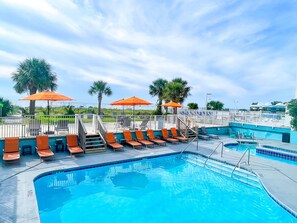 3 outdoor pools, a heated pool, open 9:00 AM to 11:00 PM, pool umbrellas