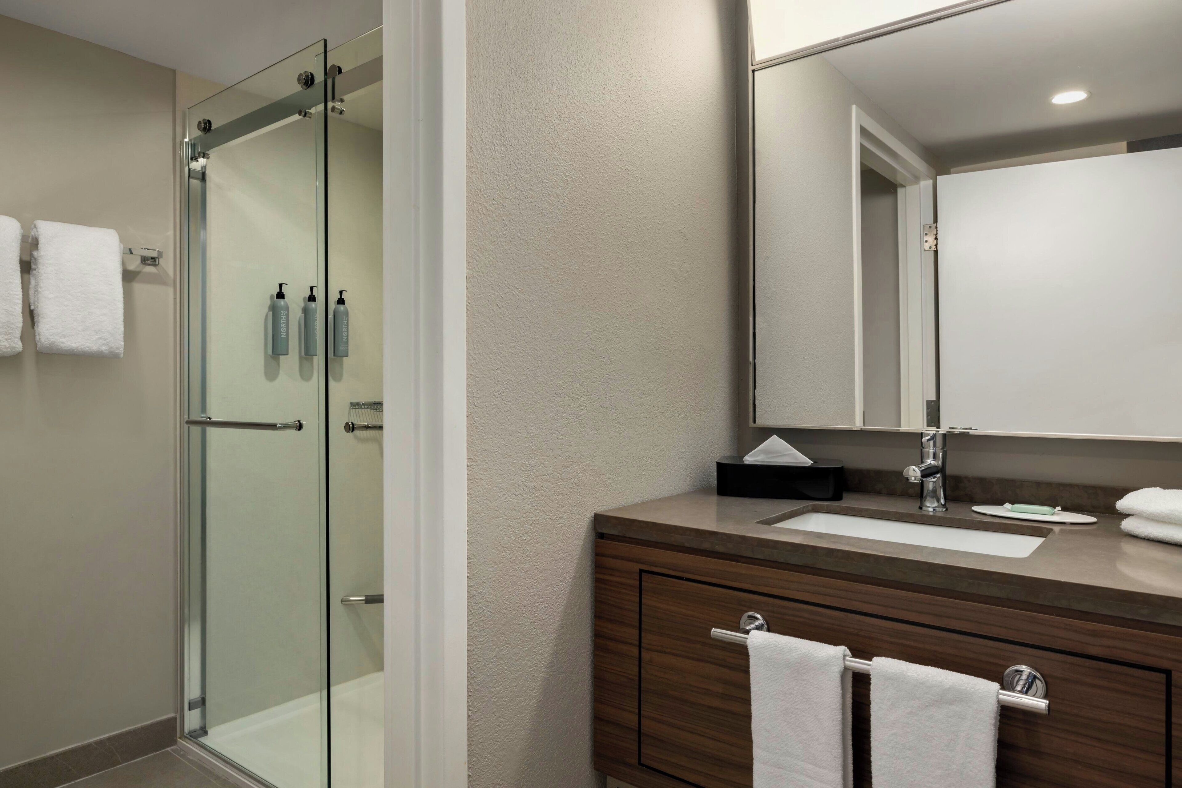 separate bathtub and shower, free toiletries, hair dryer, towels