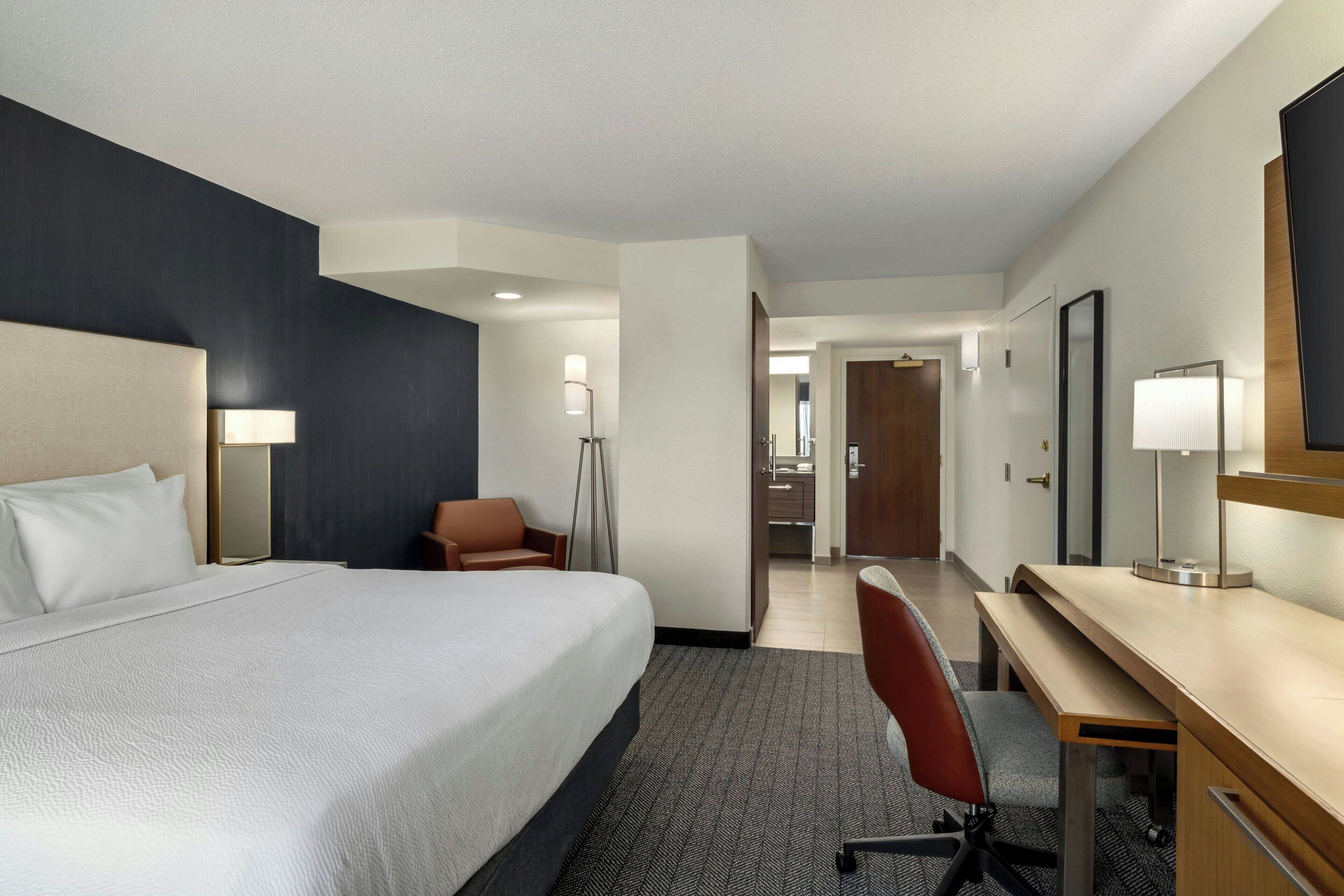 room, 1 king bed with sofa bed, non smoking | premium bedding, in-room safe, desk, laptop workspace