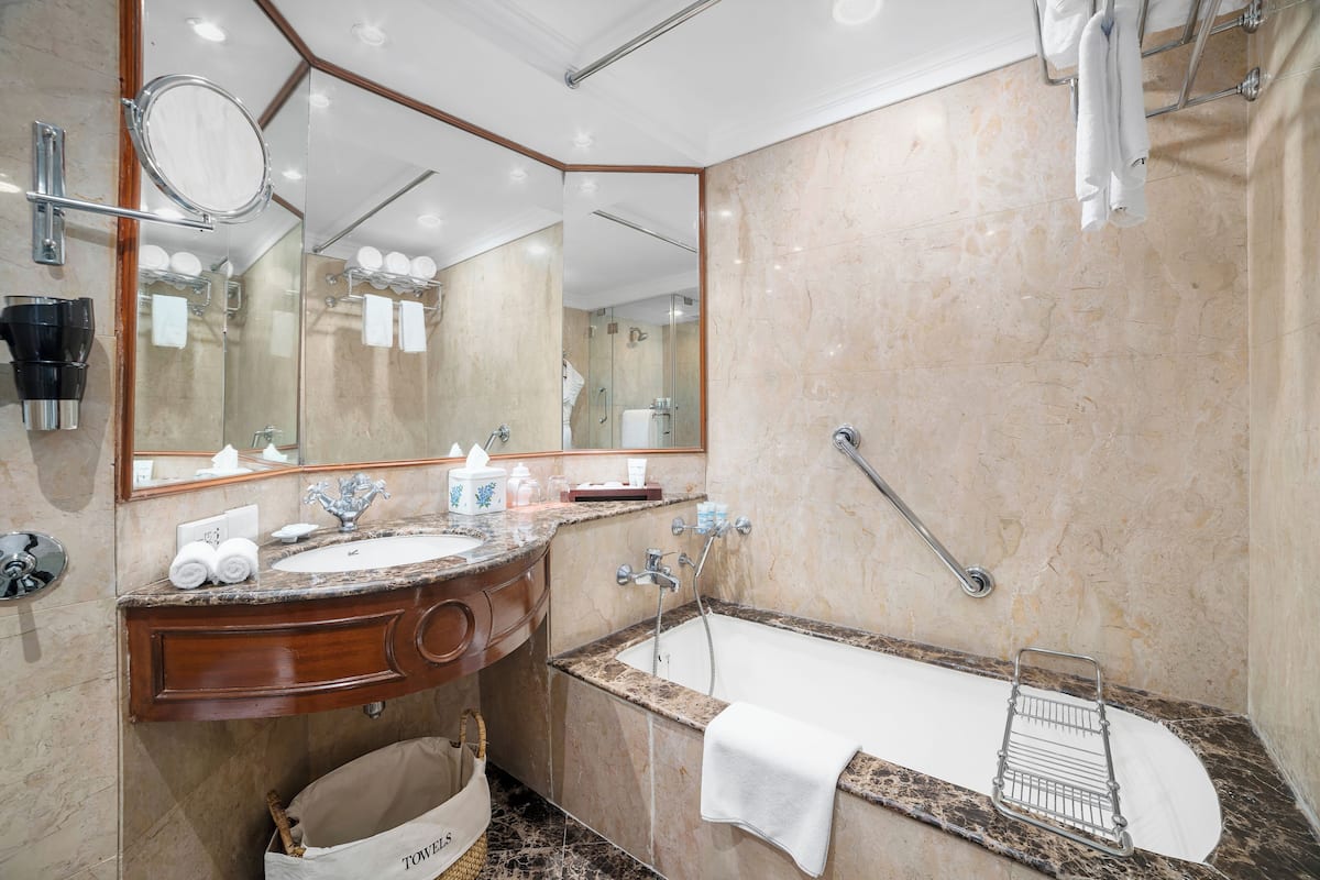 suite, 1 queen bed, pool view (contemporary suite) | 1 bedroom, premium bedding, pillow-top beds, minibar