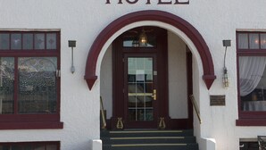 A building with the name "Van Gilder Hotel" above the entrance. - Van Gilder Hotel (Seward)