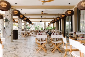 Breakfast, lunch, dinner served; international cuisine, pool views