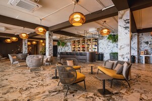 Breakfast, lunch, dinner served; international cuisine, pool views 