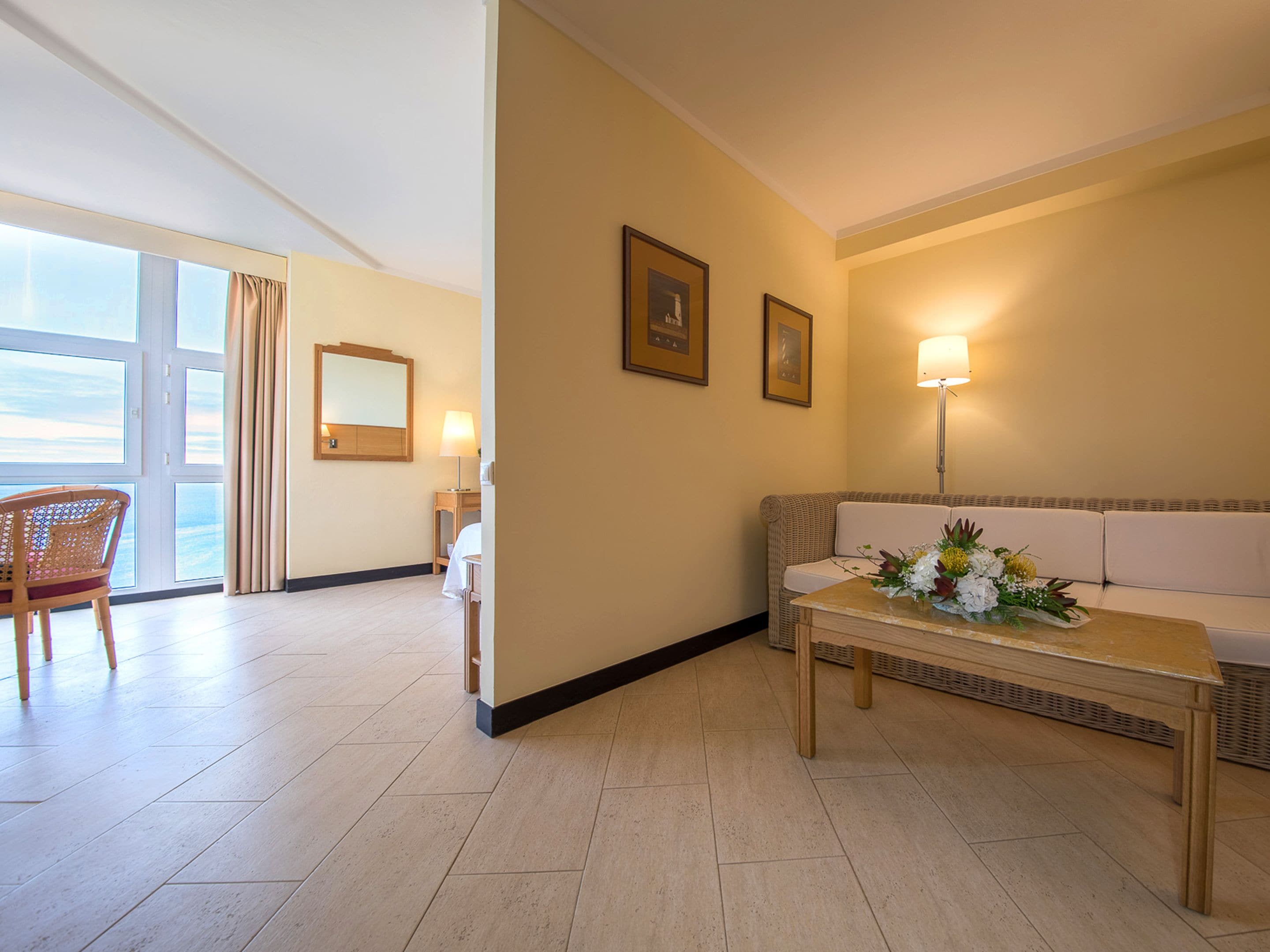 junior suite, sea view | in-room safe, desk, blackout curtains, free wifi