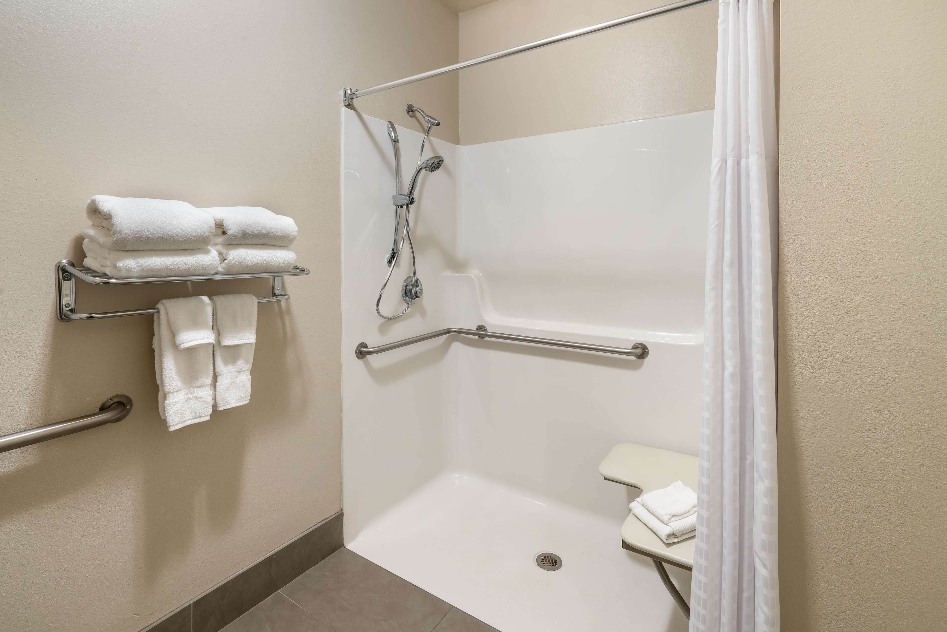 standard room, 2 queen beds, accessible, refrigerator & microwave | bathroom | combined shower/bathtub, free toiletries, hair dryer, towels