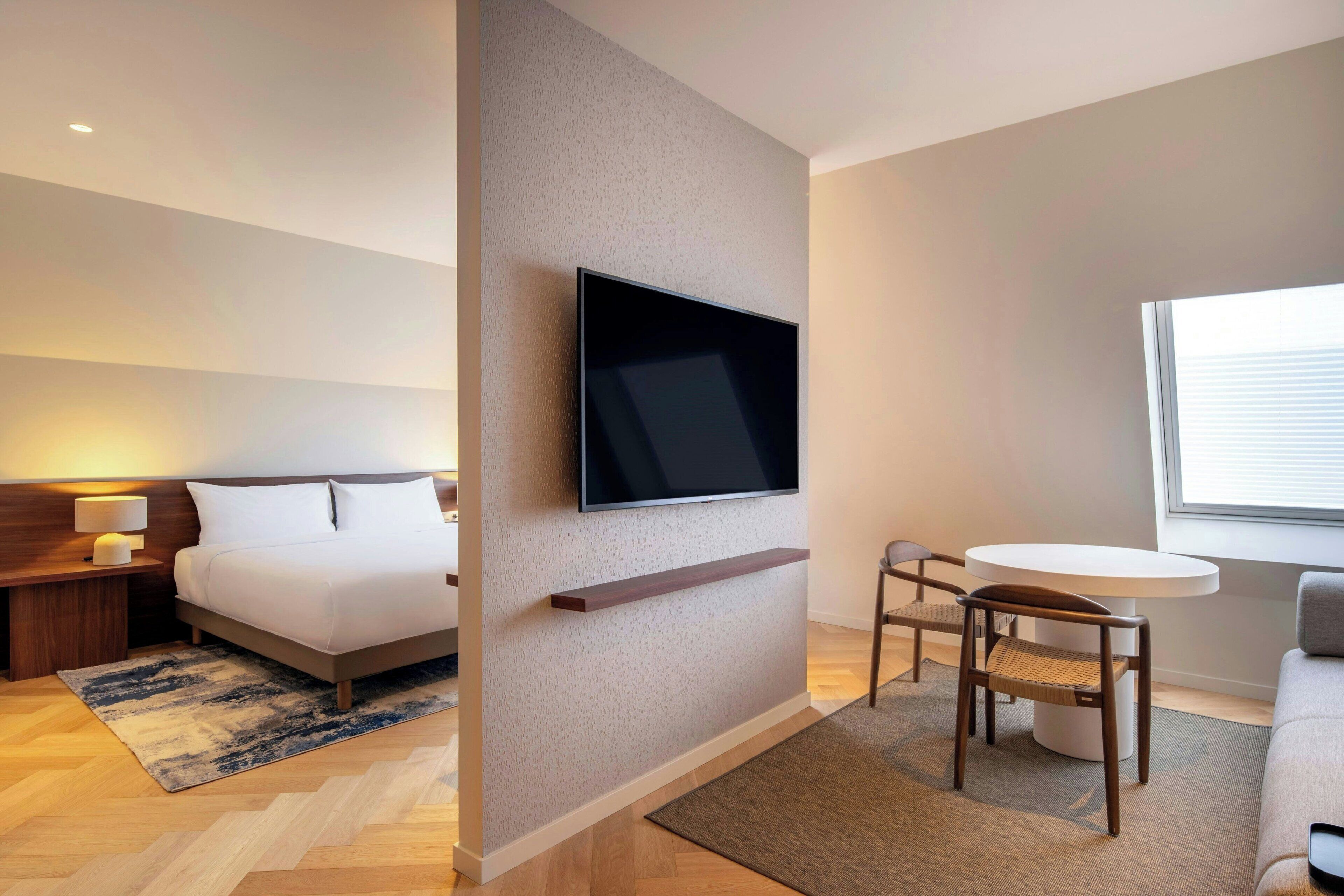 55-inch flat-screen TV with satellite channels, pay movies