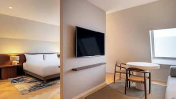 55-inch flat-screen TV with satellite channels, pay movies