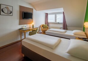 Family Room | Hypo-allergenic bedding, down comforters, in-room safe, desk