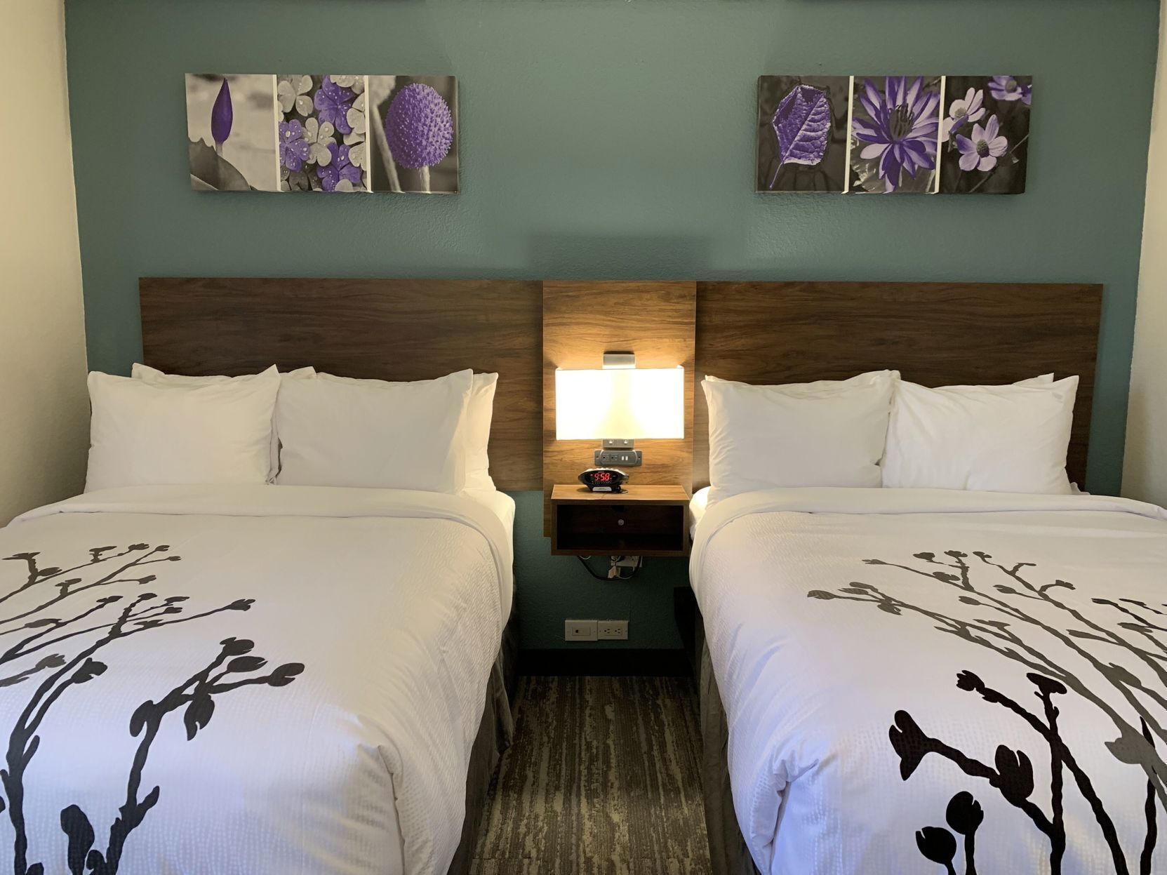 Premium bedding, pillowtop beds, desk, laptop workspace