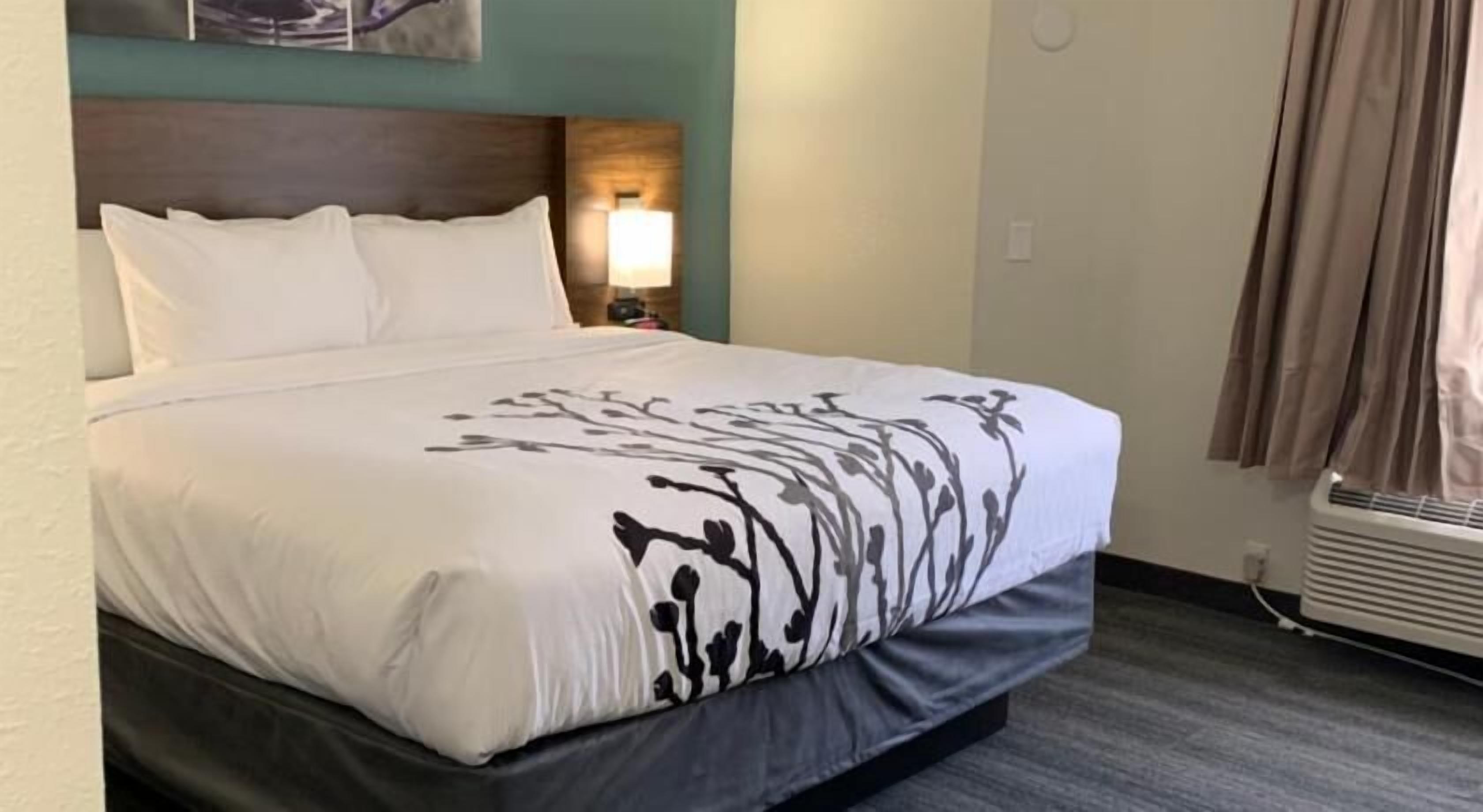 Premium bedding, pillowtop beds, desk, laptop workspace