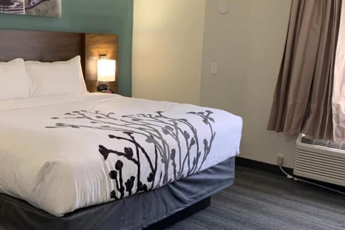 Premium bedding, pillow-top beds, desk, laptop workspace
