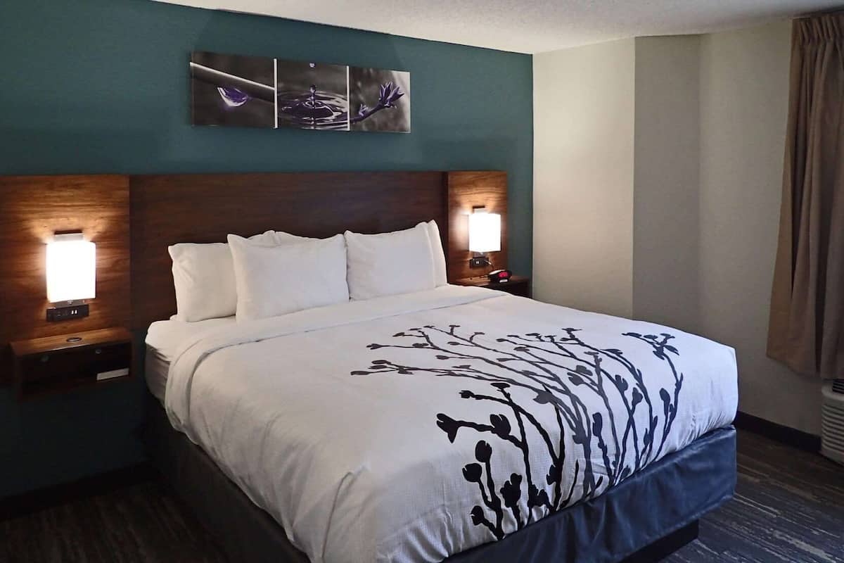 Premium bedding, pillow-top beds, desk, laptop workspace