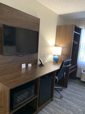Premium bedding, pillow-top beds, desk, laptop workspace