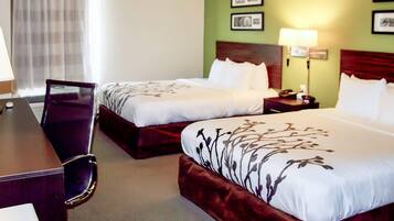 Desk, blackout drapes, iron/ironing board, free cribs/infant beds