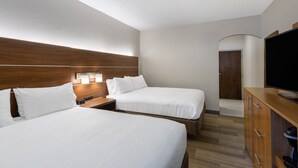 A hotel room with two beds, a wooden headboard, a flat-screen TV, and a wooden cabinet. - Holiday Inn Express Hotel & Suites Philadelphia – King of Prussia by IHG (King of Prussia)