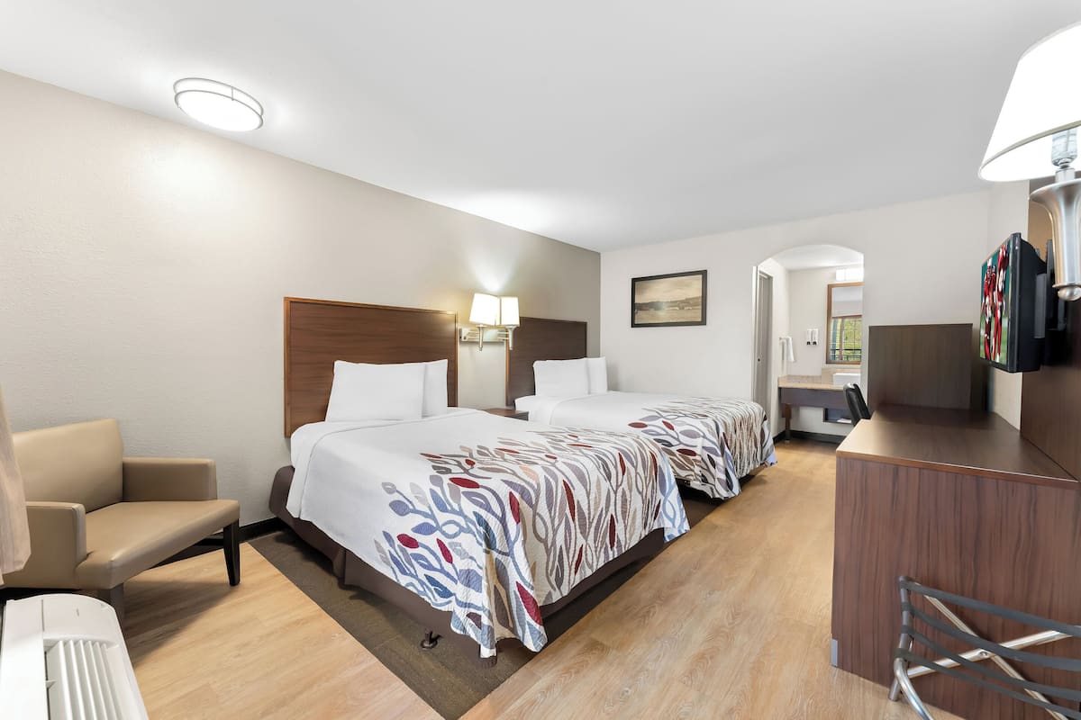 Deluxe Room, 2 Double Beds, Non Smoking | In-room safe, desk, laptop workspace, blackout drapes
