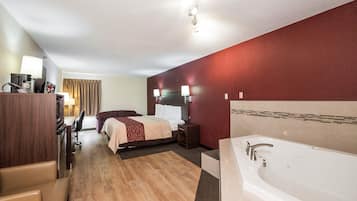Standard Suite, 1 King Bed, Non Smoking, Jetted Tub | In-room safe, desk, laptop workspace, blackout curtains