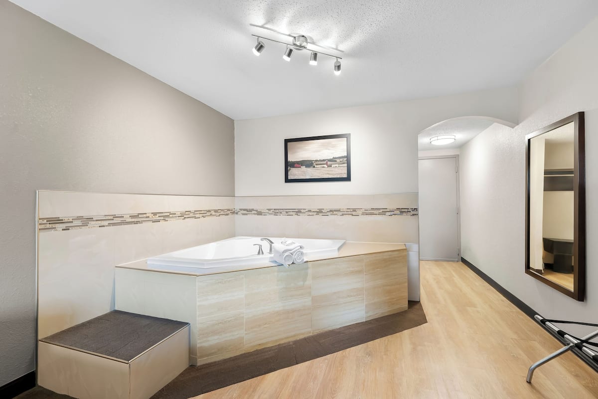 Standard Suite, 1 King Bed, Non Smoking, Jetted Tub | In-room safe, desk, laptop workspace, blackout curtains