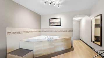 Standard Suite, 1 King Bed, Non Smoking, Jetted Tub | In-room safe, desk, laptop workspace, blackout drapes