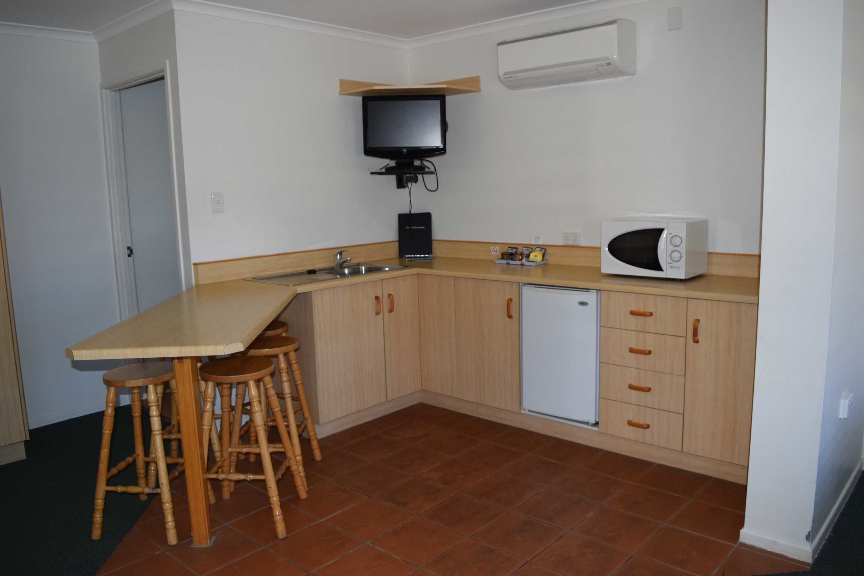 Large Family Room | Private kitchenette | Fridge, microwave, coffee/tea maker, electric kettle