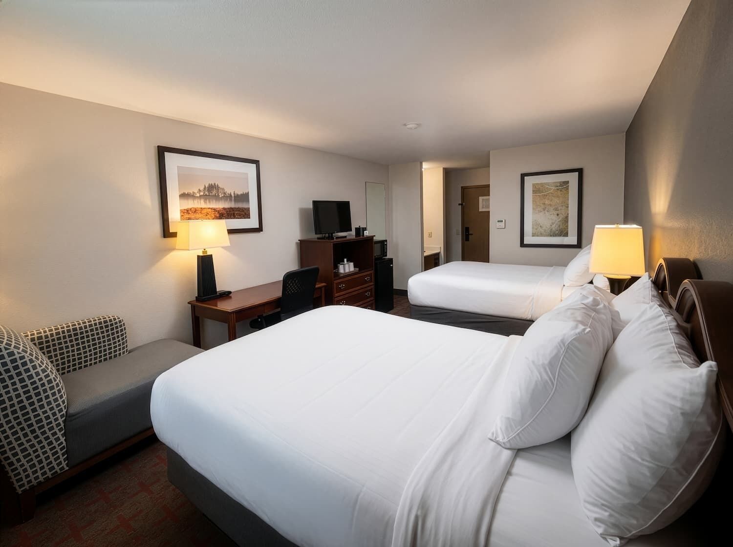 Desk, laptop workspace, blackout drapes, iron/ironing board