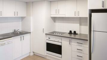 Deluxe Suite, 2 Bedrooms (King) | In-room safe, laptop workspace, blackout curtains, iron/ironing board