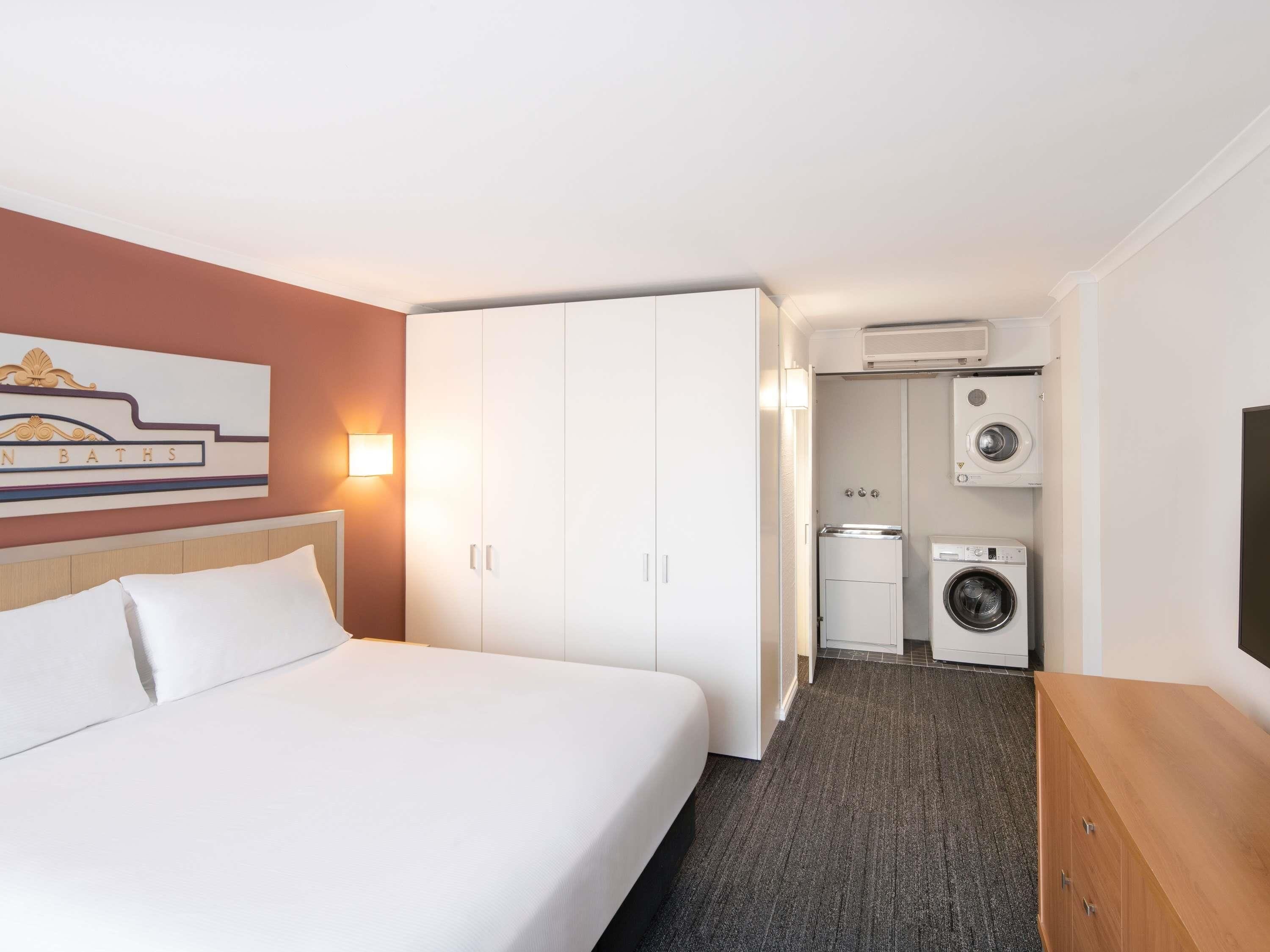 Deluxe Suite, 2 Bedrooms (King) | In-room safe, laptop workspace, blackout drapes, iron/ironing board