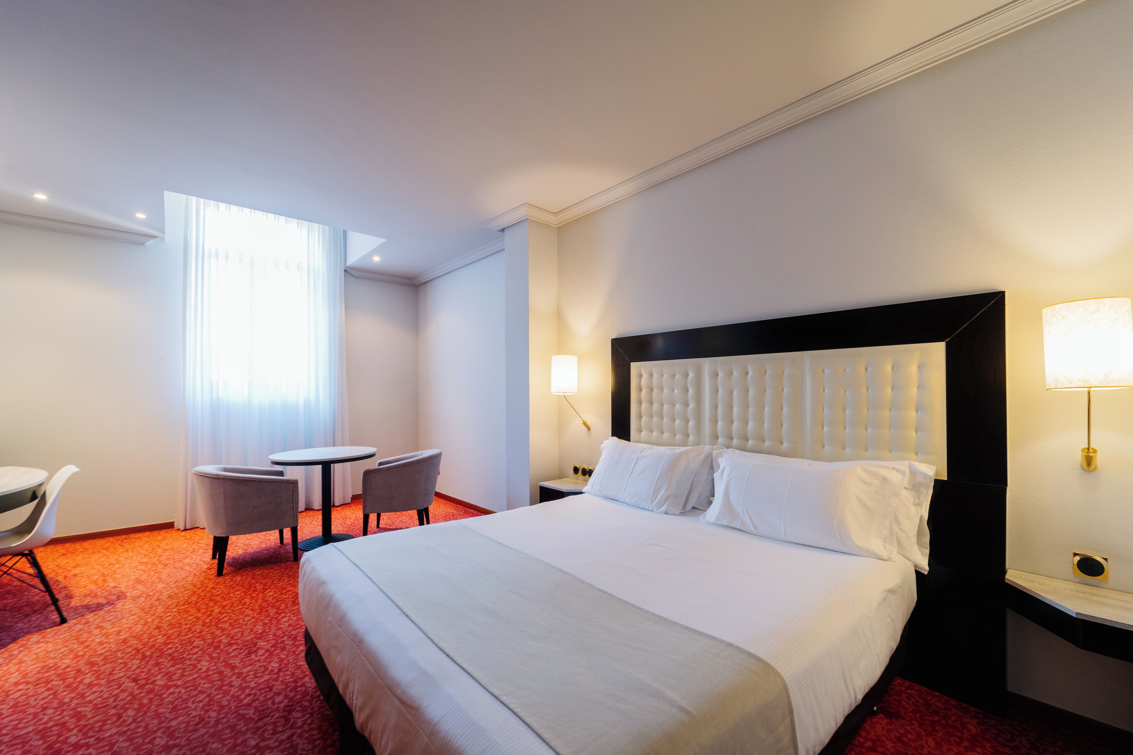 Habitación estándar (Single) | Minibar, caja de seguridad en la habitación y escritorio 