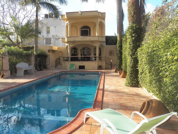 Outdoor pool, open 10 AM to 9 PM, sun loungers