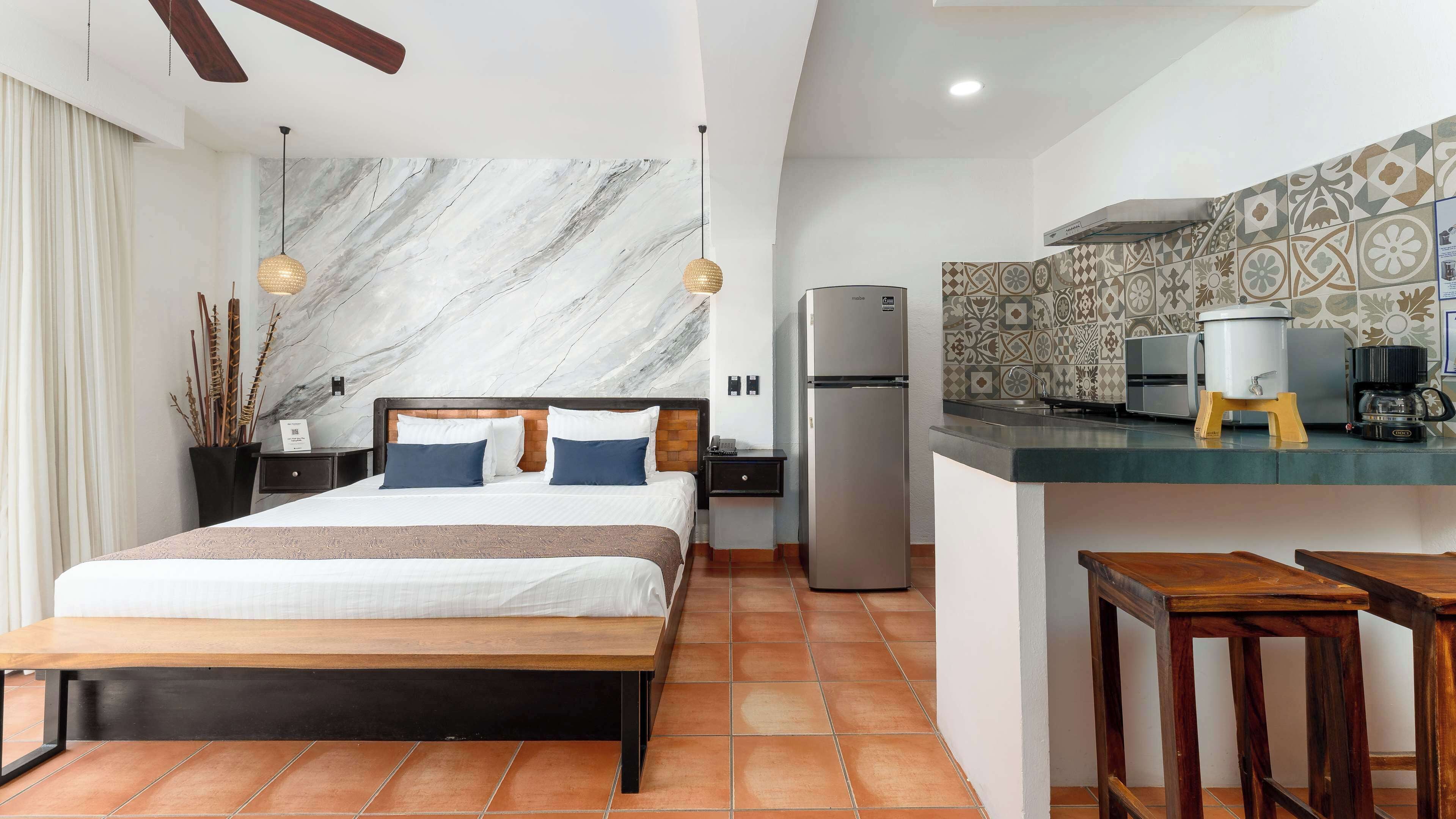 suite, 1 king bed, non smoking, kitchenette (city view) | down duvets, in-room safe, desk, blackout curtains