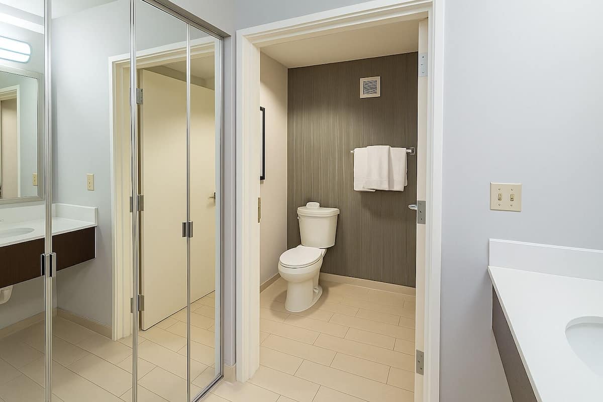 hypo-allergenic bedding, desk, blackout curtains, iron/ironing board