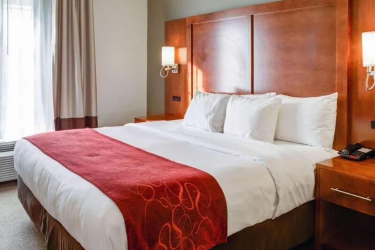 Pillow-top beds, desk, blackout curtains, iron/ironing board