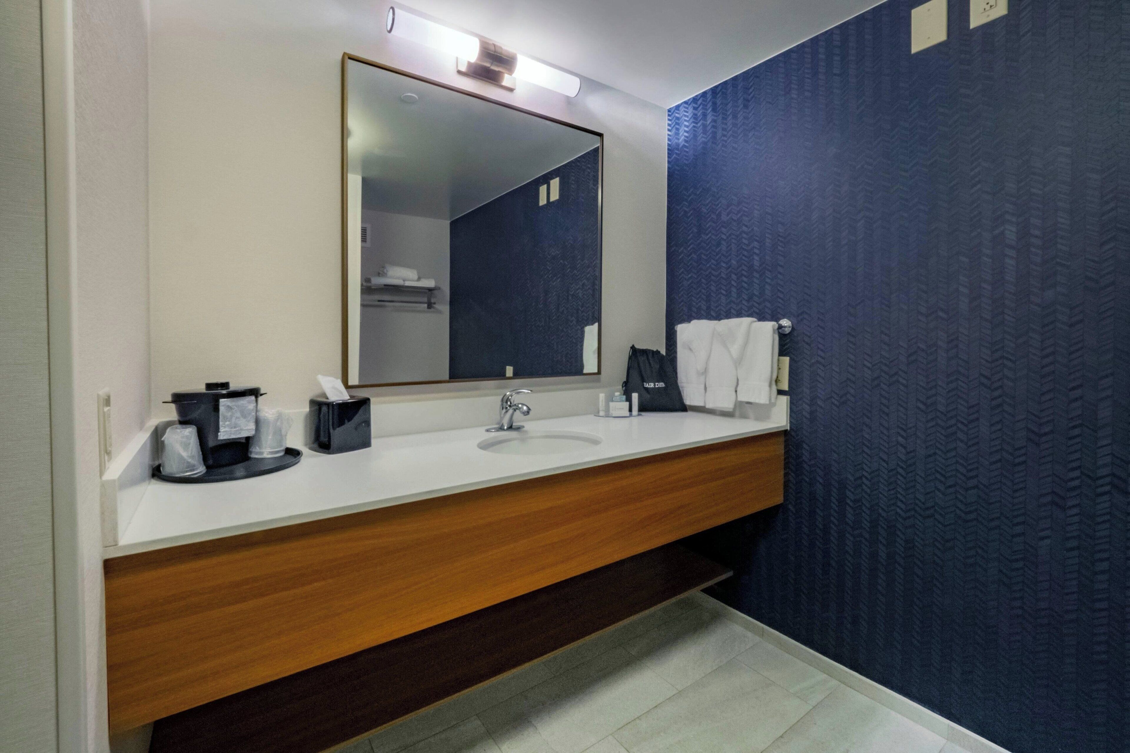 combined shower/bathtub, free toiletries, hair dryer, towels