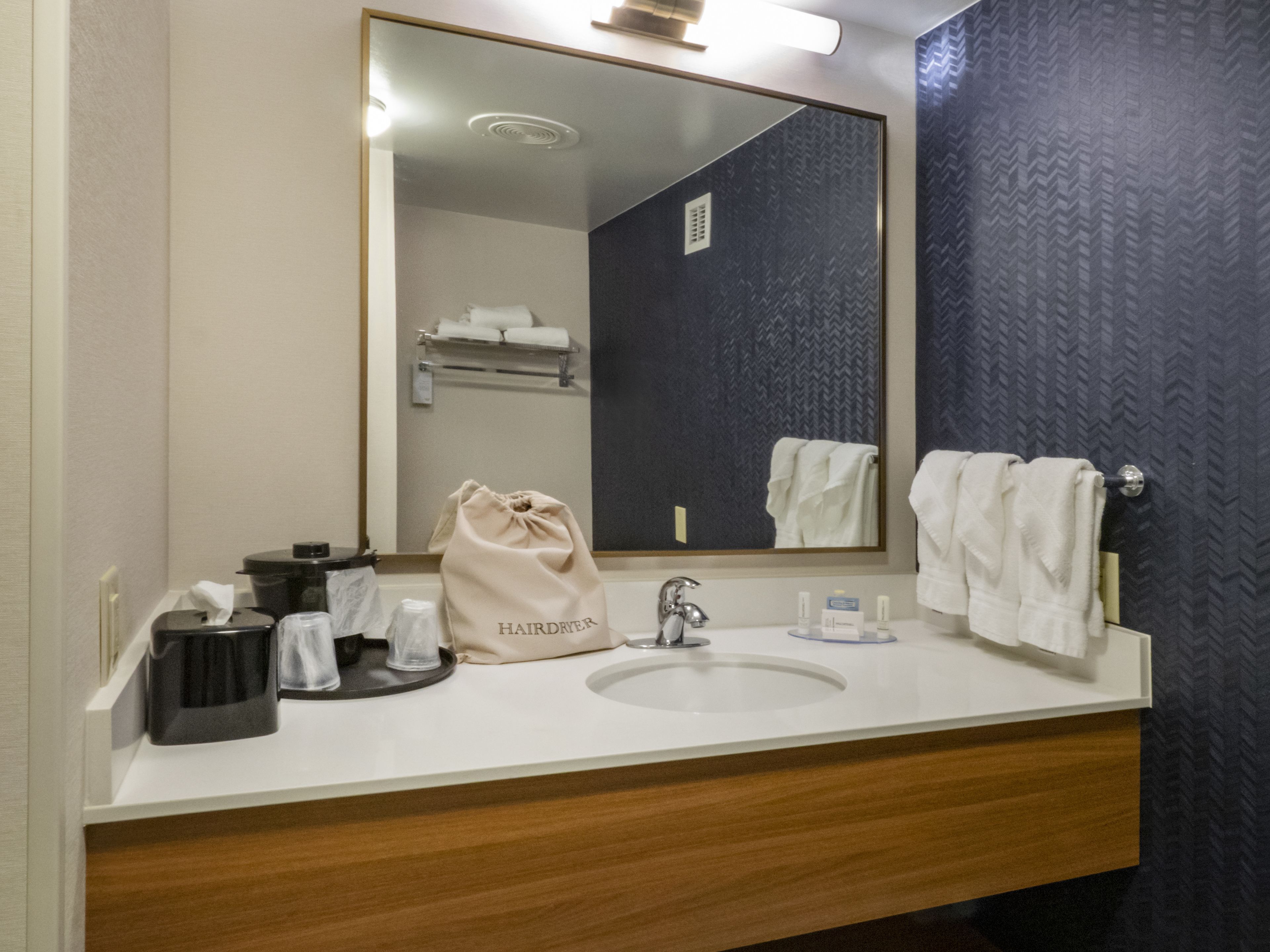 combined shower/bathtub, free toiletries, hair dryer, towels