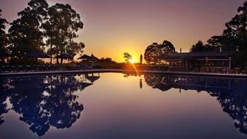 Indoor pool, seasonal outdoor pool, pool umbrellas, sun loungers