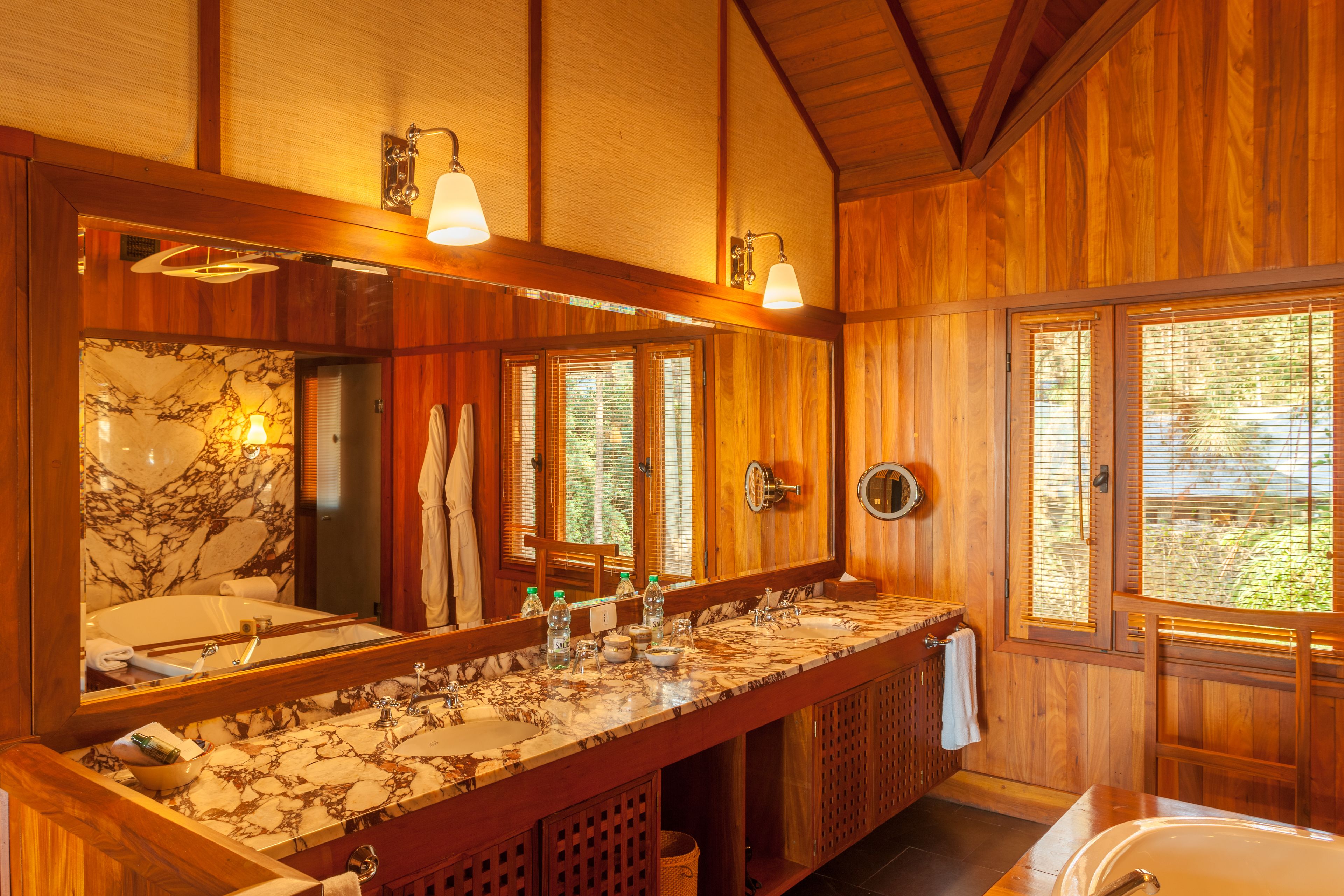 premium suite (bi level) | bathroom | separate bathtub and shower, deep-soaking bathtub, rainfall showerhead