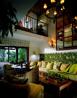 Suite (Bi Level) | Living area | LCD TV, DVD player, iPod dock, first-run movies