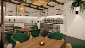 A modern dining area with green upholstered chairs, a wooden table, and a ceiling with hanging lights.