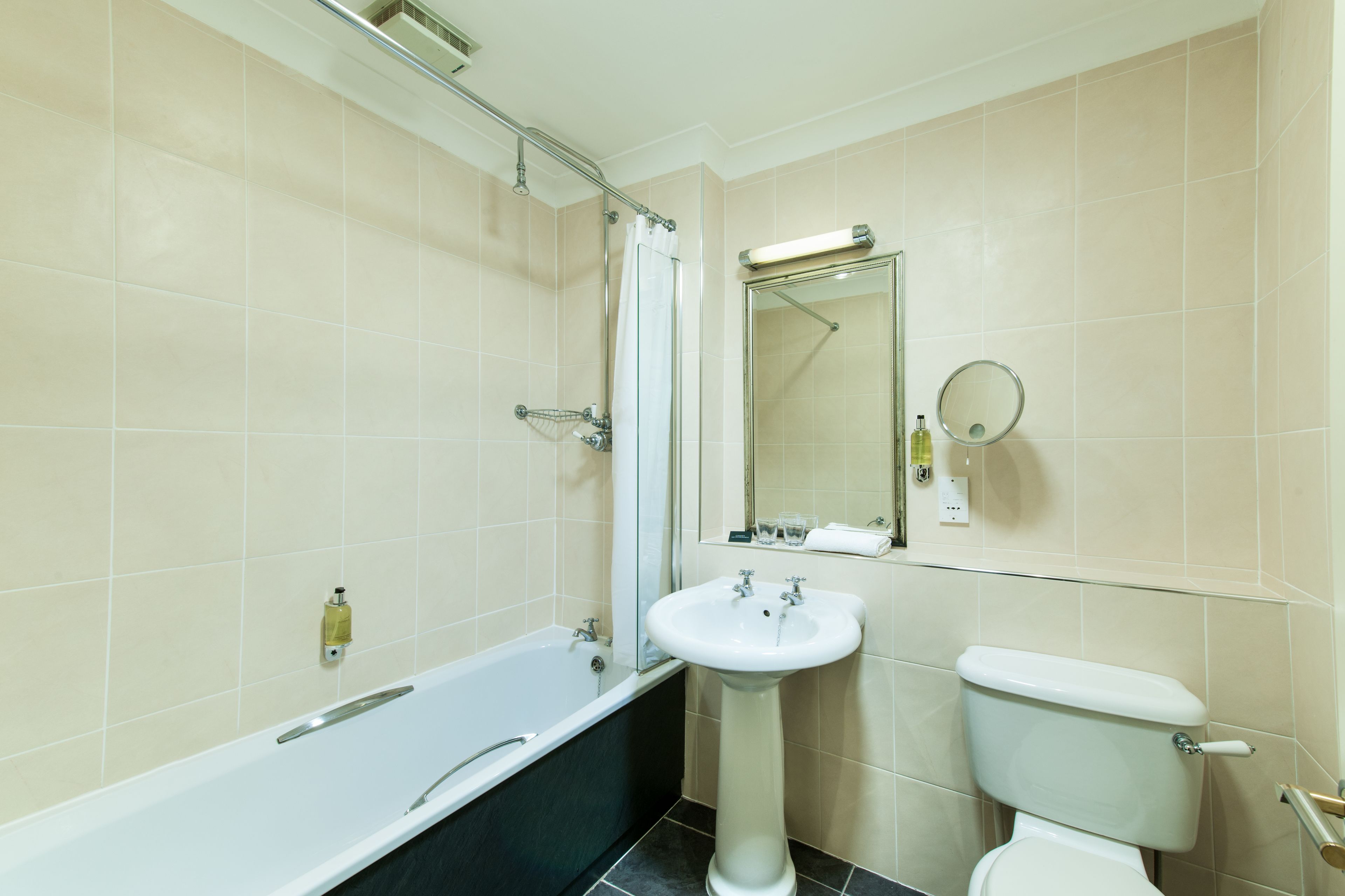 combined shower/bathtub, free toiletries, hair dryer, towels