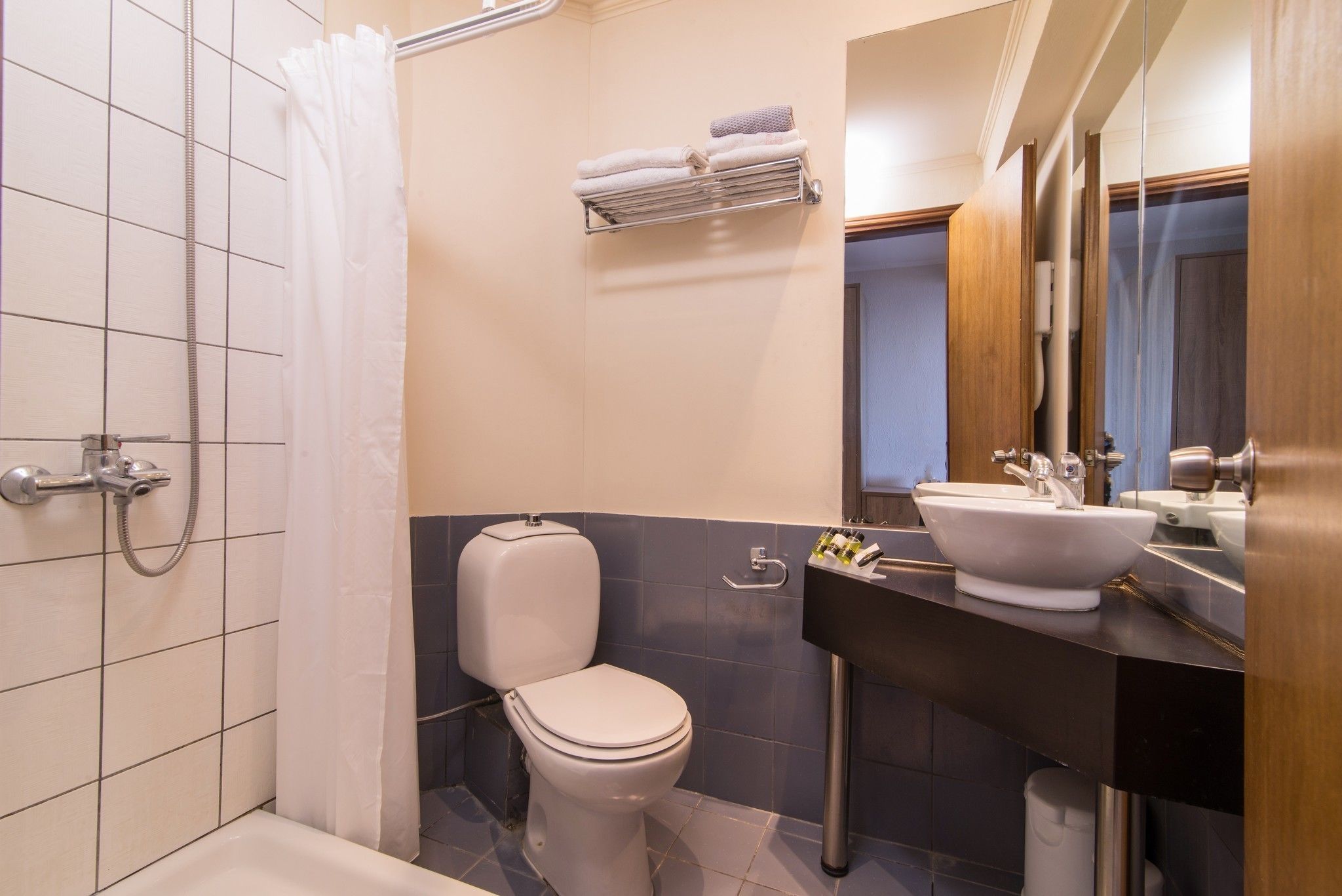 shower, free toiletries, hair dryer, slippers