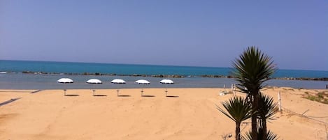 Playa de arena blanca y traslado desde/hacia la playa 