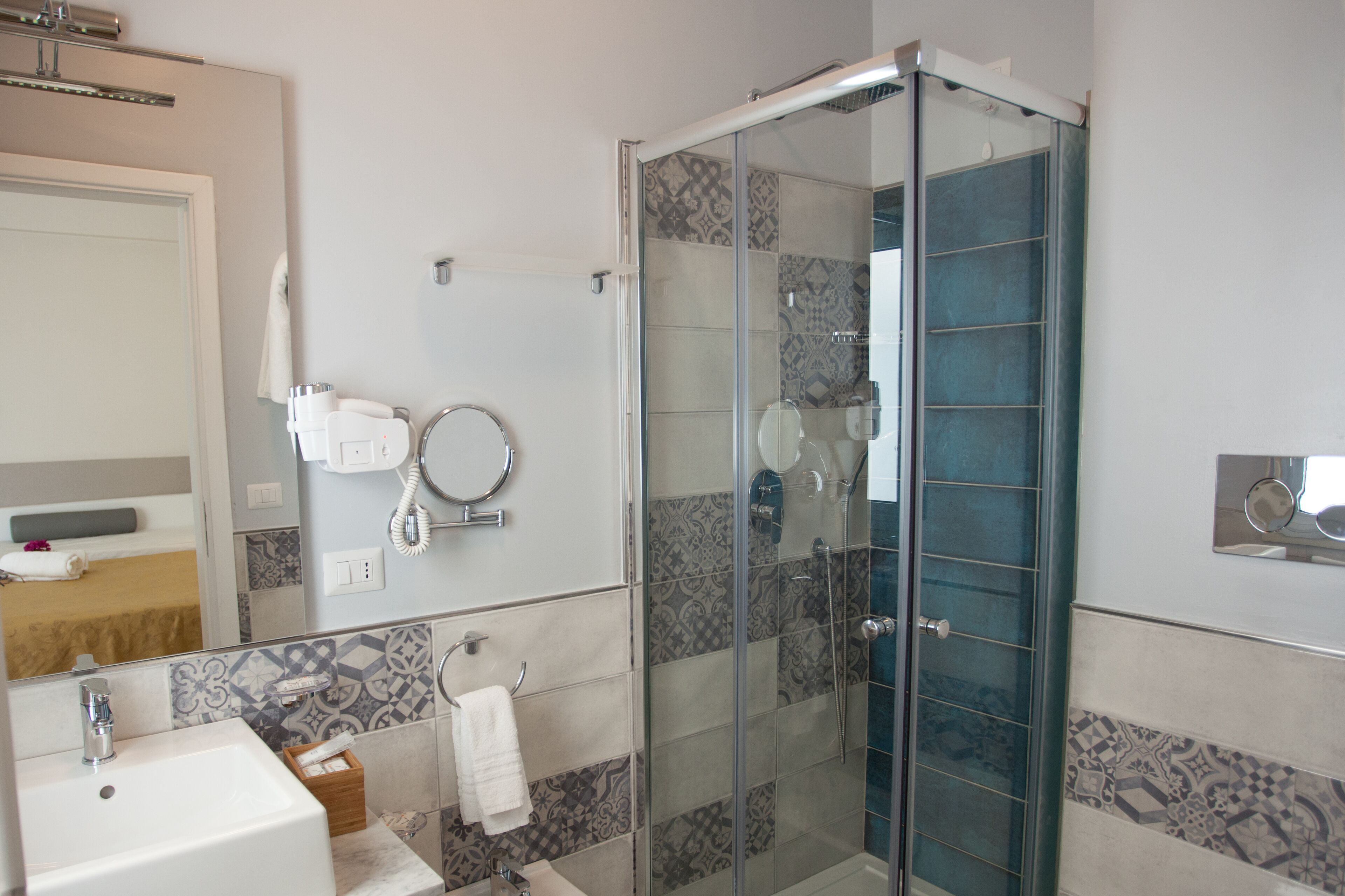 free toiletries, hair dryer, slippers, bidet