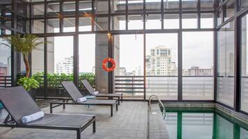 Outdoor pool, open 6:00 AM to 10:00 PM, sun loungers