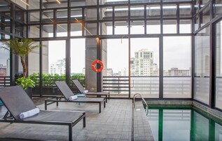 Outdoor pool, open 6:00 AM to 10:00 PM, sun loungers